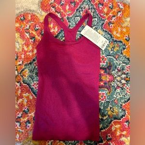 BRAND NEW Ebb to Street tank Lululemon size 2 (color magenta purple)
